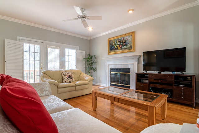 living room with a white couch and wood flooring